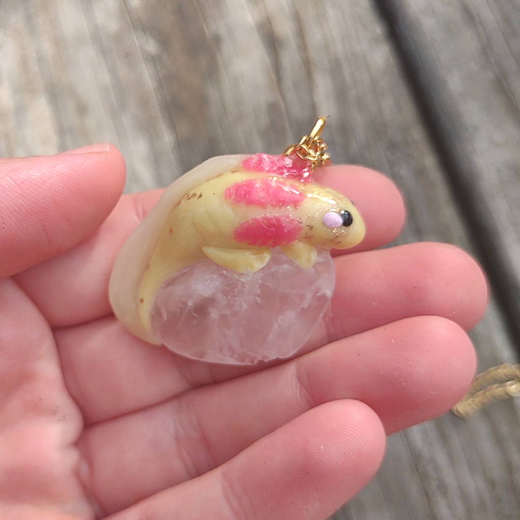 I made some axolotl charms - I used Fimo effects rose quartz and